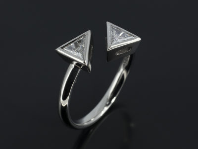 Ladies Diamond Engagement Ring, Platinum Rub over Set Contemporary Twist Design, Trilliant Cut Diamonds x2