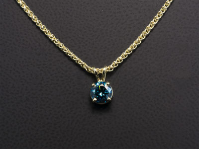 9kt Yellow Gold 4 Claw Set Coloured Diamond Solitaire Pendant, Round Brilliant Cut Blue Treated Diamond, 1.00ct., Split Bale Detail on a 9kt Yellow Gold 16-18 Inch Spiga Chain
