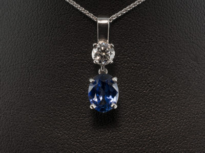 18kt White Gold Claw Set Sapphire and Diamond Drop Pendant, Oval Cut Sapphire 1.58ct with Round Brilliant Cut Diamond 0.43ct F VS2 EXEXEX on a Spiga Chain