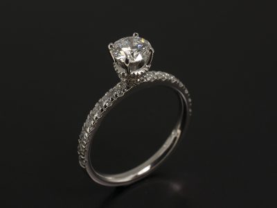 Platinum Claw set Design with Castle set shoulders and side set diamonds, Round Lab Diamond 0.70ct D VS2 EXEXEX