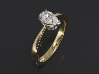 18kt Yellow & White Gold Claw Set Solitaire Design. Pear Shape Lab Diamond, 0.72ct. F Colour, VS2 Clarity.