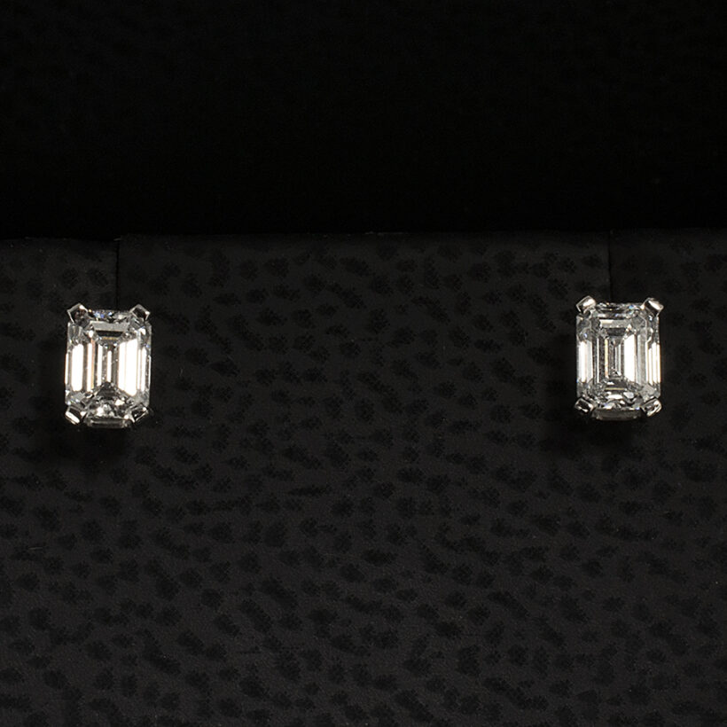 Platinum 4 Claw Set Emerald Cut Diamond 0.61ct (2) Studded Earrings with Locking Fittings
