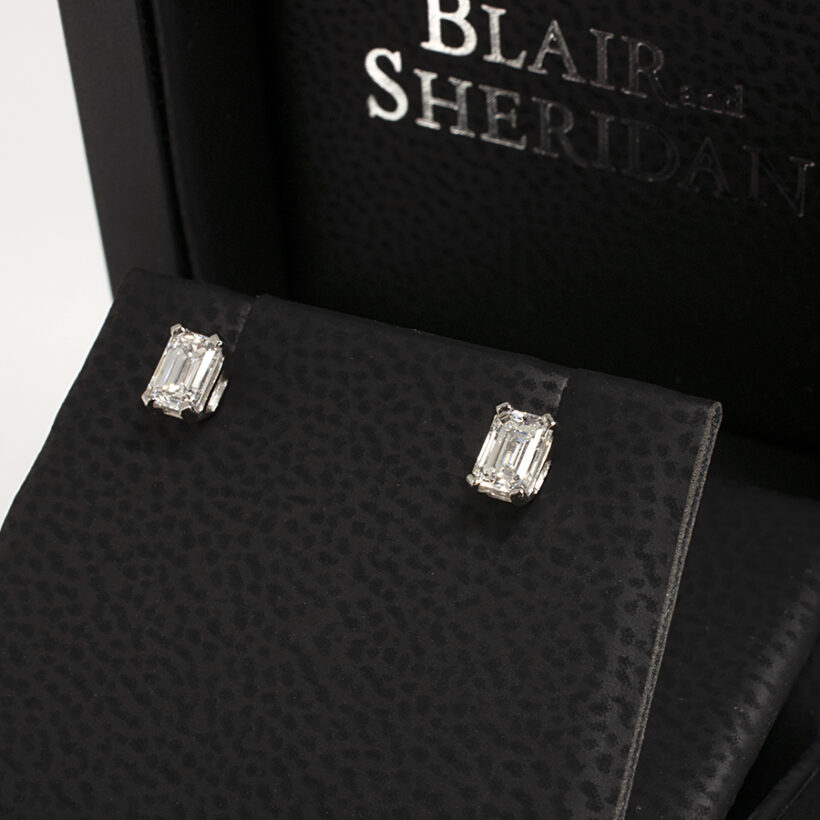 Platinum 4 Claw Set Emerald Cut Diamond 0.61ct (2) Studded Earrings with Locking Fittings