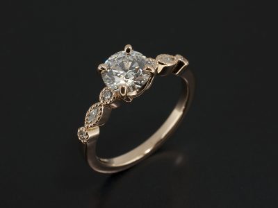 Ladies Diamond Engagement Ring, 18kt Rose Gold, Lab Grown Round Diamond 0.93ct D SI1 EXEXEX With Round and Marquise Side Diamonds, Claw Set Design with Millgrain Detail to Shoulders