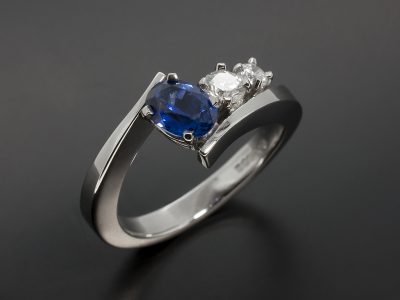 Ladies Trilogy Sapphire and Diamond Engagement Ring, Platinum Claw Set Twist Design, Oval Cut Sapphire 1.09ct, Round Brilliant Cut Diamonds 0.27ct, 0.15ct