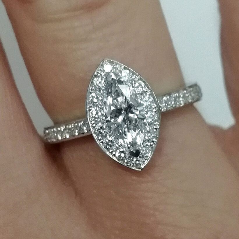 Marquise Cut Diamond 0.51ct Platinum Claw and Pavé Set Halo Design Engagement Ring