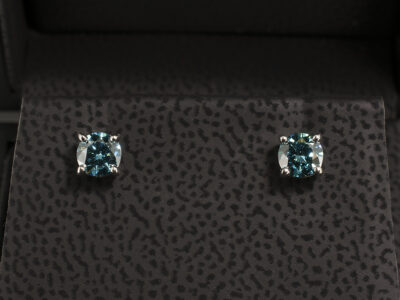 Platinum 4 Claw Set Coloured Diamond Stud Earrings, Round Brilliant Cut Treated Blue Diamonds 0.61ct Total