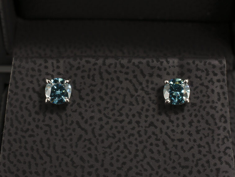 Platinum 4 Claw Set Coloured Diamond Stud Earrings, Round Brilliant Cut Treated Blue Diamonds 0.61ct Total