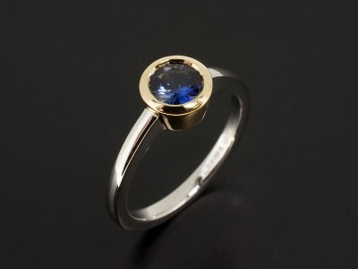 Round Blue Sapphire 0.81ct in an 18kt Yellow Gold Rub Over and Platinum Design Ladies Ring