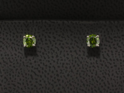 Platinum 4 Claw Set Coloured Diamond Stud Earrings, Round Brilliant Cut Treated Green Diamond 0.56ct Total