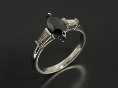 Platinum Claw Set Trilogy Design with Marquise Black Diamond 0.69ct and Tapered Baguette Cut Lab Grown Diamonds 0.25ct