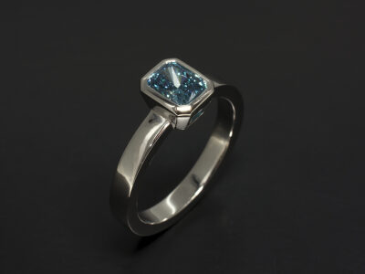 Platinum Rub Over Set Contemporary Design with Radiant Cut Lab Grown Blue Diamond 1.12ct VS1 Clarity