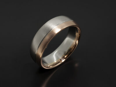 Two Tone Gent's Wedding Ring in Platinum and 18kt Rose Gold with Grooved Line Detail and Brushed finish