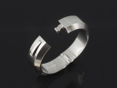 Gents Hinged Wedding Ring, Platinum with offset Chamfered Edge, Date Stamp Detail on Flat Section, 6mm Width - open