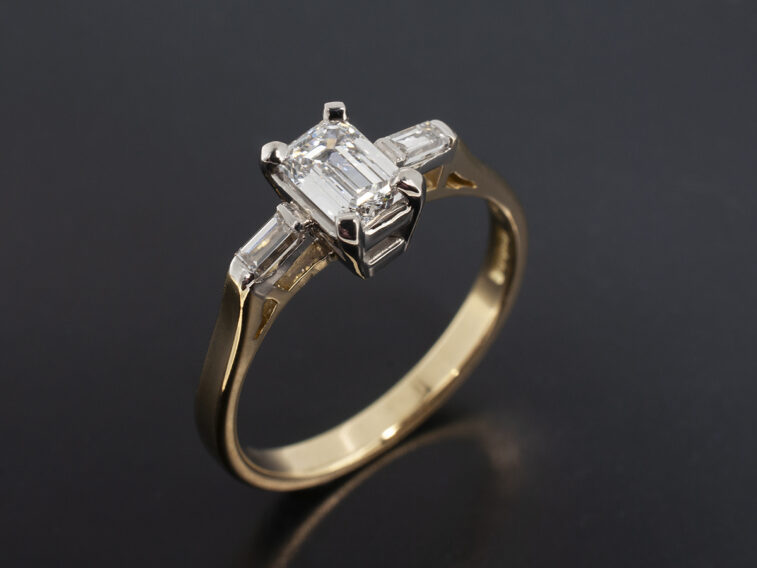 Ladies Diamond Trilogy Engagement Ring, 18kt White Claw Set and Yellow Gold Design, Emerald Cut Diamond 0.50ct D Colour VS2 Clarity and Baguette Cut Diamond Side Stones 0.14ct Total