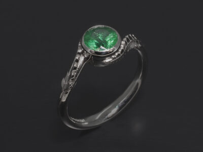 Ladies Emerald Dress Ring, Platinum Rub over Set Design, Round Brilliant Cut Emerald 0.61ct, Fern Detail Band