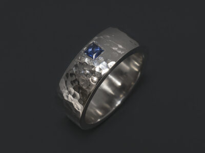 Ladies Sapphire Dress Ring, Platinum Design with Secret Set Princess Cut Sapphire, 0.14ct, Hammered Finish