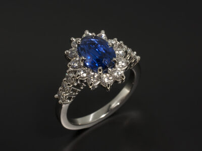 Ladies Sapphire and Diamond Dress Ring, Platinum Claw Set Halo Design, Oval Cut Sapphire 1.82ct, Round Brilliant Cut Diamonds 0.73ct Total