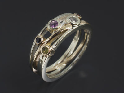 Ladies Semi Precious Stone Dress Ring, 9kt Yellow and White Gold Rub over Set Satellite Design, Garnet, Pink Sapphire, Blue Sapphire, Peridot and Salt & Pepper Diamond