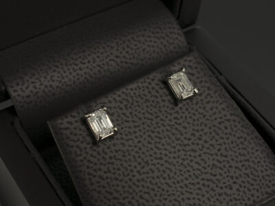 Platinum Claw Set Diamond Stud Earrings, Lab Grown Emerald Cut Diamonds 1.10ct Total D Colour VS1 Clarity