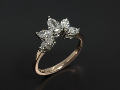 Platinum and 18kt Rose Gold Claw Set Fitted Wedding Ring with Marquise Cut Diamonds 0.66ct and Pear Cut Diamond 0.33ct