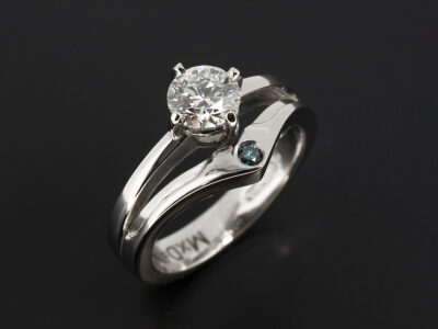Ladies Diamond Engagement Ring, Platinum Twin Band Claw and Secret Set Design, Round Brilliant Cut Diamond 0.70ct D Colour I-F Clarity, Round Brilliant Cut Blue Treated Diamond