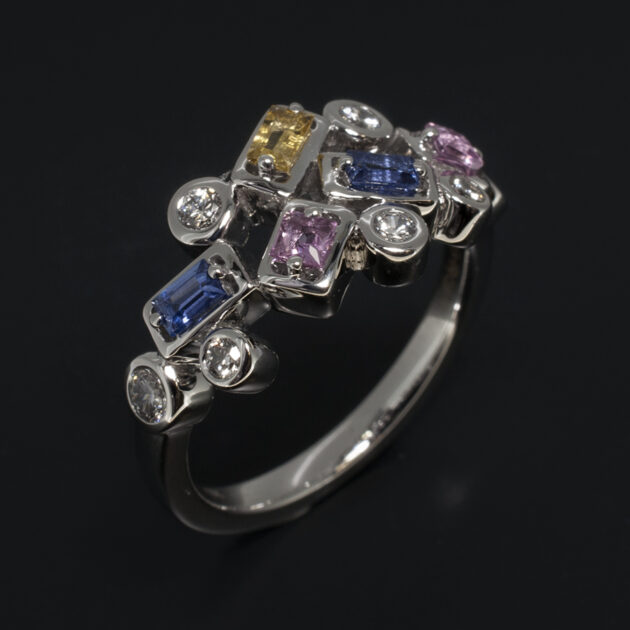 Ladies Diamond and Multi Coloured Sapphire Dress Ring, 18kt White Gold Rub over Set Design, Round Brilliant Cut Diamonds 0.32ct (5) and Baguette Cut Multi Coloured Sapphires 0.53ct (7)