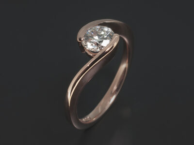 Ladies Solitaire Diamond Engagement Ring, 18kt Rose Gold Semi Tension Set Twist Design, Round Brilliant Cut Lab Grown Diamond 0.91ct. F Colour VS2 Clarity