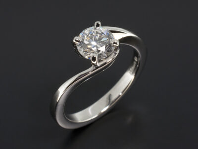 Ladies Solitaire Diamond Engagement Ring, Platinum Claw Set Solitaire Twist Design, Round Brilliant Cut Diamond, 0.90ct. E Colour, VS1 Clarity EXEXEX