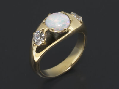 Ladies Trilogy Trilogy Dress Ring, 18kt Yellow Gold, Round Cabochon 7mm Opal, Round Brilliant Cut Diamonds, 0.50ct (2) FSI Min