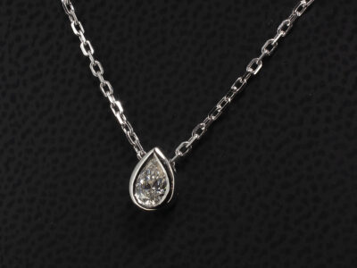 9kt White Gold Rub over Set Solitaire Diamond Pendant, Pear Shape Lab Grown Diamond 0.30ct, F Colour, VS Clarity Minimum, on a 9kt White Angled Filed Trace Chain