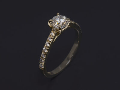 Ladies Diamond Engagement Ring, 18kt Gold Claw and Castle Set Design, Round Brilliant Cut Diamond 0.60ct, G Colour, SI2 Clarity, Round Brilliant Cut Diamond Shoulders 0.18ct Total (16), F Colour, SI Clarity