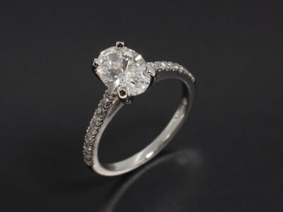 Ladies Diamond Engagement Ring, Platinum 4 Claw and Castle Set Design, Oval Cut Lab Grown Diamond 1.12ct, E Colour VVS2 Clarity, Round Brilliant Cut Diamond Shoulders