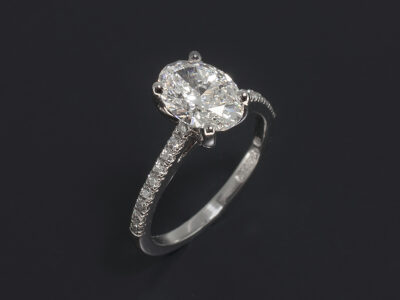Ladies Diamond Engagement Ring, Platinum Claw Set Design, Oval Cut Lab Grown Diamond, 1.56ct, G Colour, VVS2 Clarity, Round Brilliant Cut Diamond Shoulders, F Colour, VS Clarity