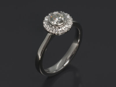 Ladies Halo Diamond Engagement Ring, Platinum Rub over and Claw Set Design, Round Brilliant Cut Diamond 0.47ct, F-G Colour, I Clarity, Round Brilliant Cut Diamond Halo 0.14ct (14), F Colour, VS Clarity