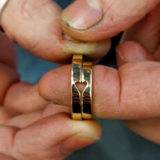 When joined together these wedding rings form a love heart cut out design