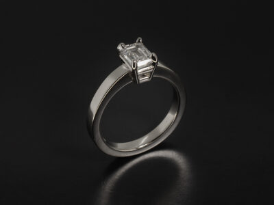 Ladies Diamond Solitaire Engagement Ring, Platinum 4 Claw Basket Set Design with Square Shape Band Detail, Emerald Cut Diamond 0.96ct, F Colour, VSI Clarity