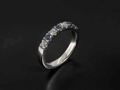 Ladies Diamond and Sapphire Eternity Ring, Platinum Castle Set Design, 7 Stone x2.8mm of Round Brilliant Cut Lab Grown Diamonds and Round Cut Blue Sapphires