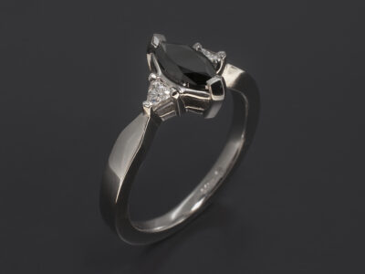 Ladies Black Diamond Trilogy Engagement Ring, Platinum Claw Set Design, Marquise Shaped Black Diamond 0.71ct, Trilliant Cut White Diamond Side Stones 0.11ct (2), F Colour, SI Clarity Min
