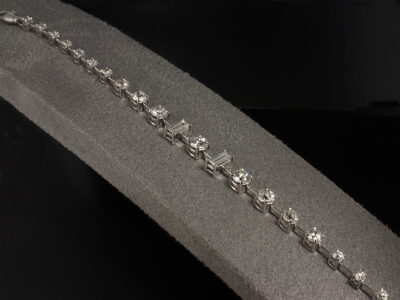 Ladies Diamond Tennis Bracelet, 18kt White Gold Claw Set Design, Round Brilliant Cut, Old Miners Cut and Baguette Cut Diamonds
