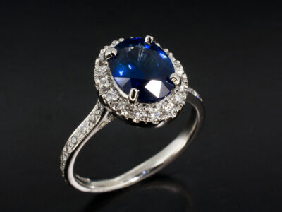 Ladies Diamond and Sapphire Engagement Ring, Platinum Claw and Pavé Set Halo Design, Oval Cut Sapphire 2.44ct, Lab Grown Diamond Set Shoulders & Backrails 0.37ct Total