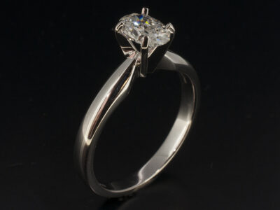 Ladies Solitaire Diamond Engagement Ring, Platinum Claw Set Design, Oval Cut Diamond, 0.70ct