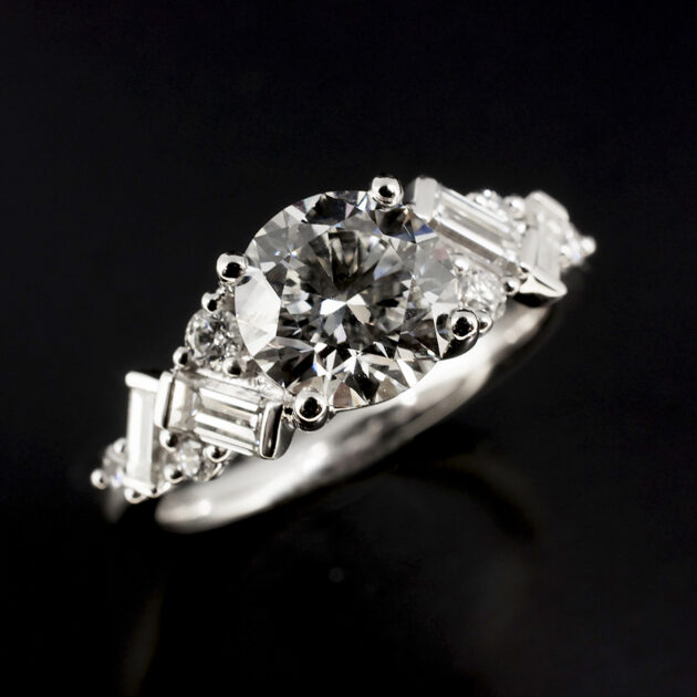 Platinum Claw Set Diamond Ring, Round Brilliant Cut Lab Grown Centre Stone with Baguette and Round Cut Side Diamonds