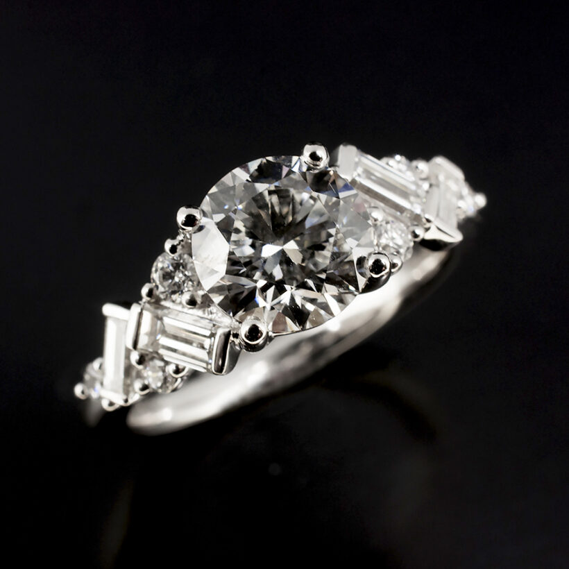 Platinum Claw Set Diamond Ring, Round Brilliant Cut Lab Grown Centre Stone with Baguette and Round Cut Side Diamonds