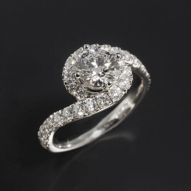 Round Brilliant Cut Lab Grown Diamond Ring with Diamond Set Halo and Shoulders, Compass Set Twist Design in Platinum