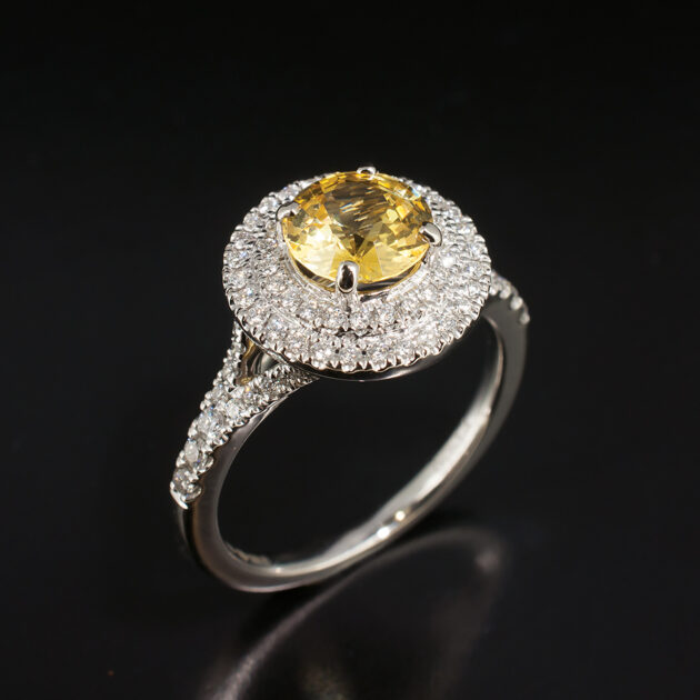 Yellow Sapphire Ring in Platinum with Diamond Set Halo and Split Shoulder Detail