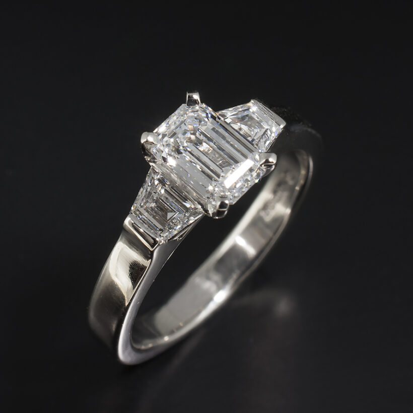 Ladies Lab Grown Diamond Trilogy Engagement Ring, Platinum Claw Set Design, Emerald Cut Lab Grown Diamond 0.97ct, D Colour, VS2 Clarity, EXVG, Trapezium Cut Lab Grown Diamonds 0.45ct (2)