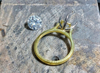 feature image - hand made ring on the jewellers bench