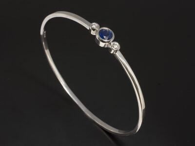 Ladies 18kt White Gold Rub over Set Sapphire and Diamond Bangle, Round Cut Sapphire 1.55ct, Round Brilliant Cut Diamonds 0.30ct Total (2)