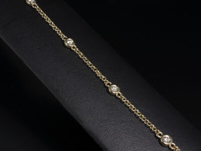 Ladies Diamond and Gold Bracelet, 9kt Yellow Gold Rub over Set Design, Round Brilliant Cut Diamonds 0.50ct Total (5)